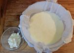 With all the kefir in the cloth lined bowl, tie two corners together on each side, so you can lift up the cloth to drain the whey...